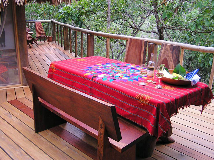 Handcrafted picnic table, bench and chairs for dinners overlooking the river